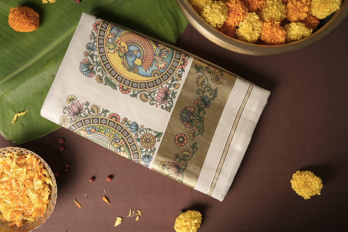 Peacock_Frame_Tissue_Kasavu_Saree